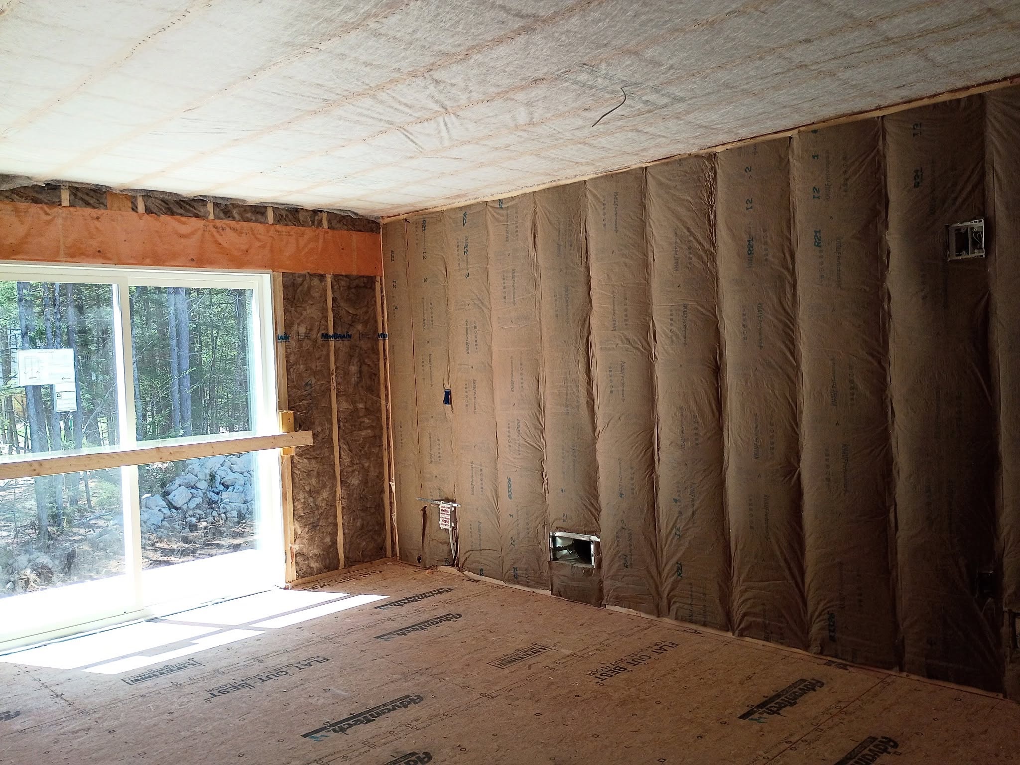 Room insulation with vapor barrier and ceiling detail in Mont Vernon New Hampshire
