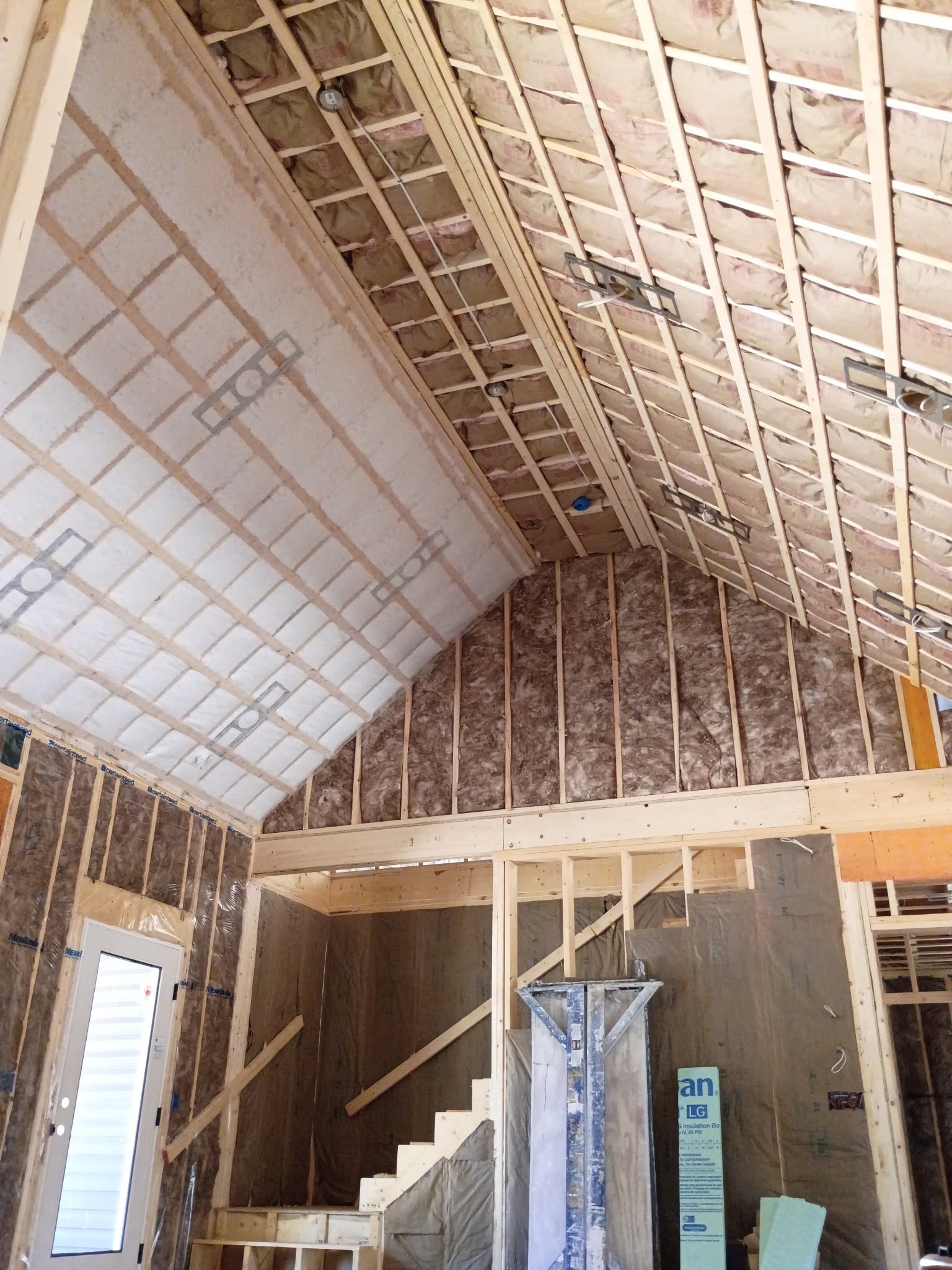 Vaulted ceiling batt insulation in a Mont Vernon New Hampshire new home