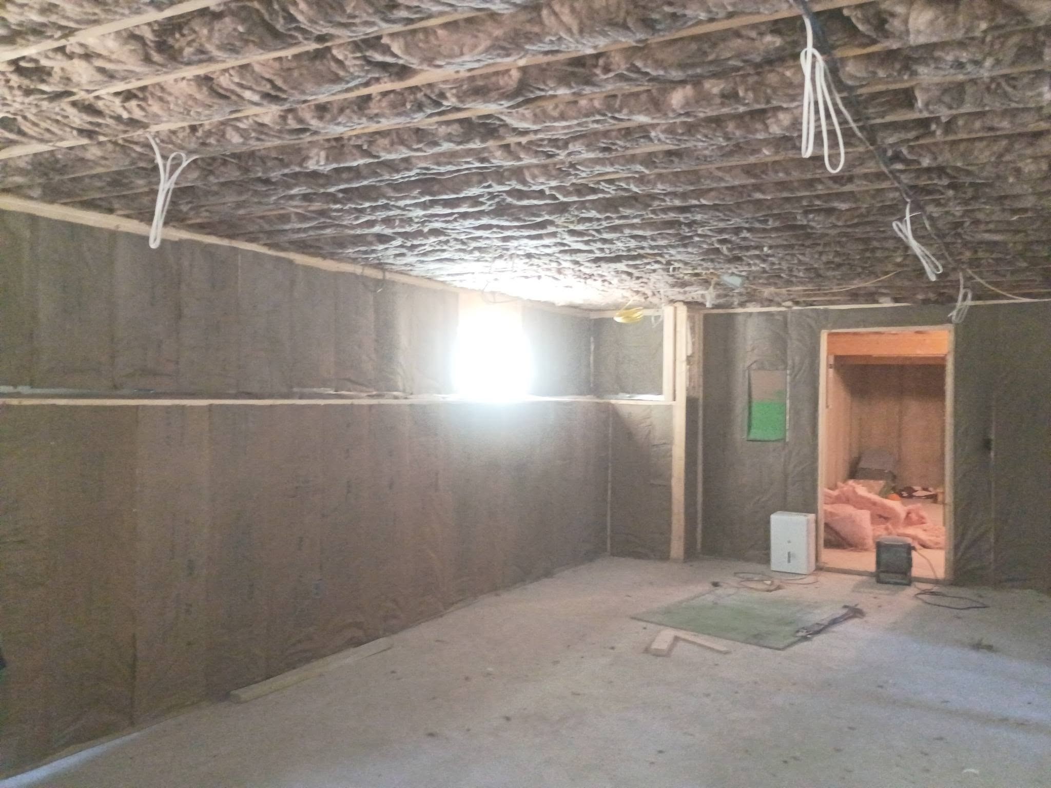 Ceiling and wall insulation installation in a Mont Vernon New Hampshire project