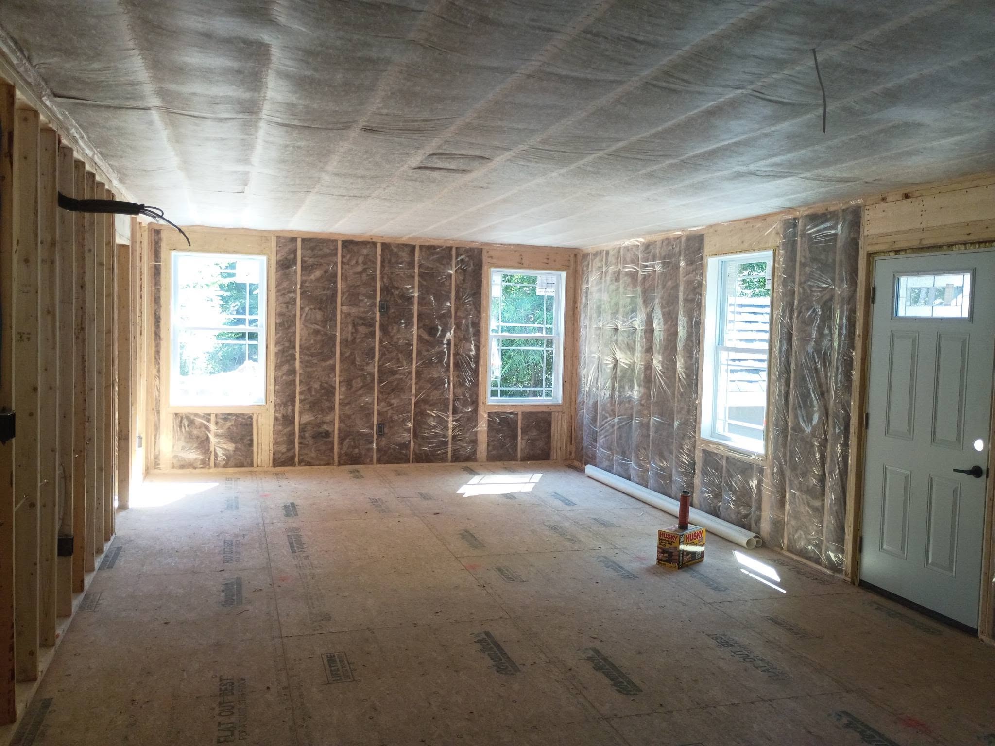 Room with fiberglass batt insulation and vapor barrier in Mont Vernon New Hampshire
