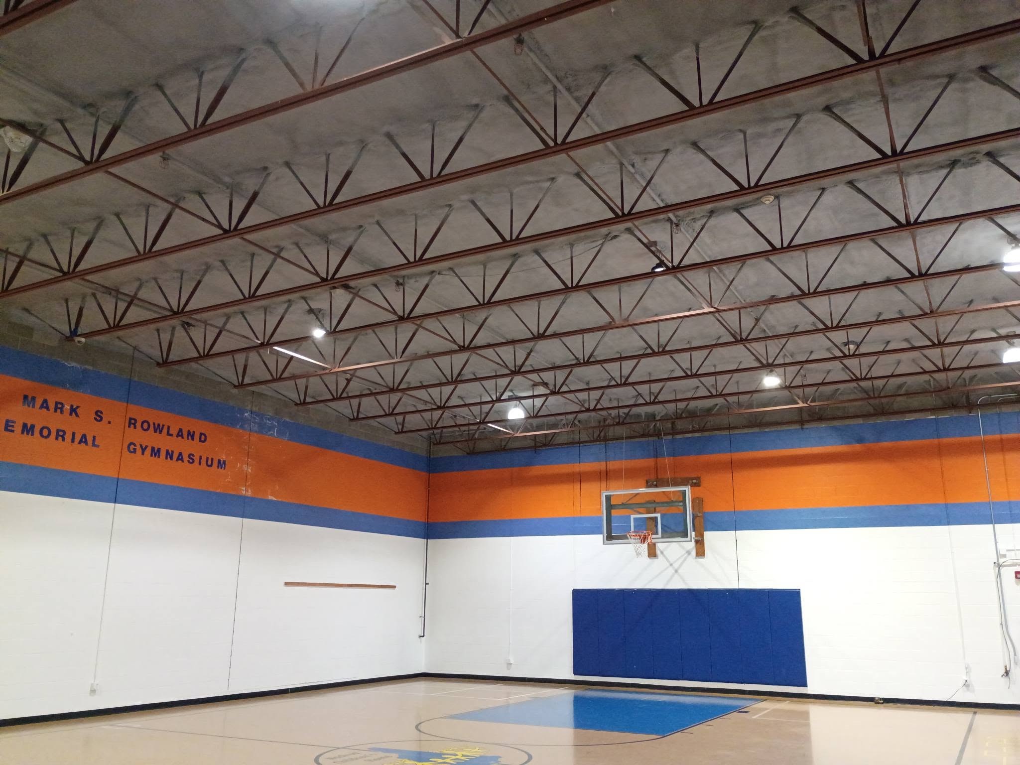Commercial gymnasium spray foam roof deck insulation in Nashua New Hampshire