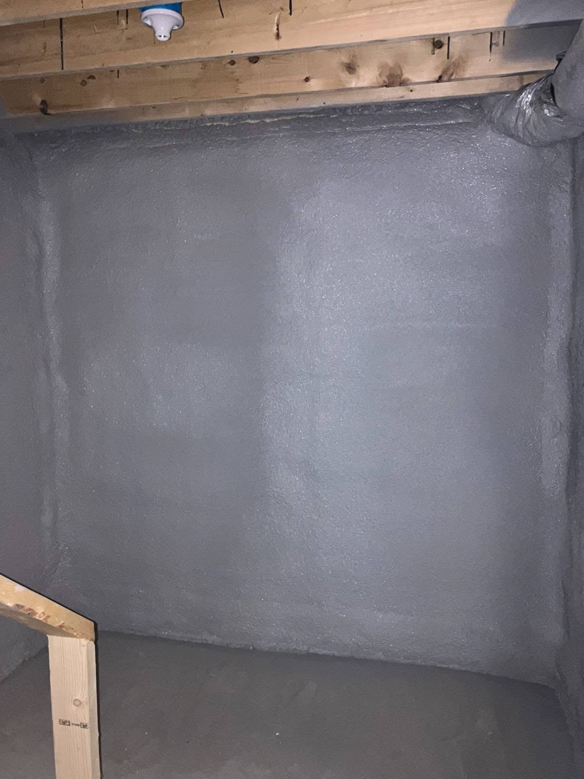 Spray foam insulation installed in a New Hampshire new home foundation area