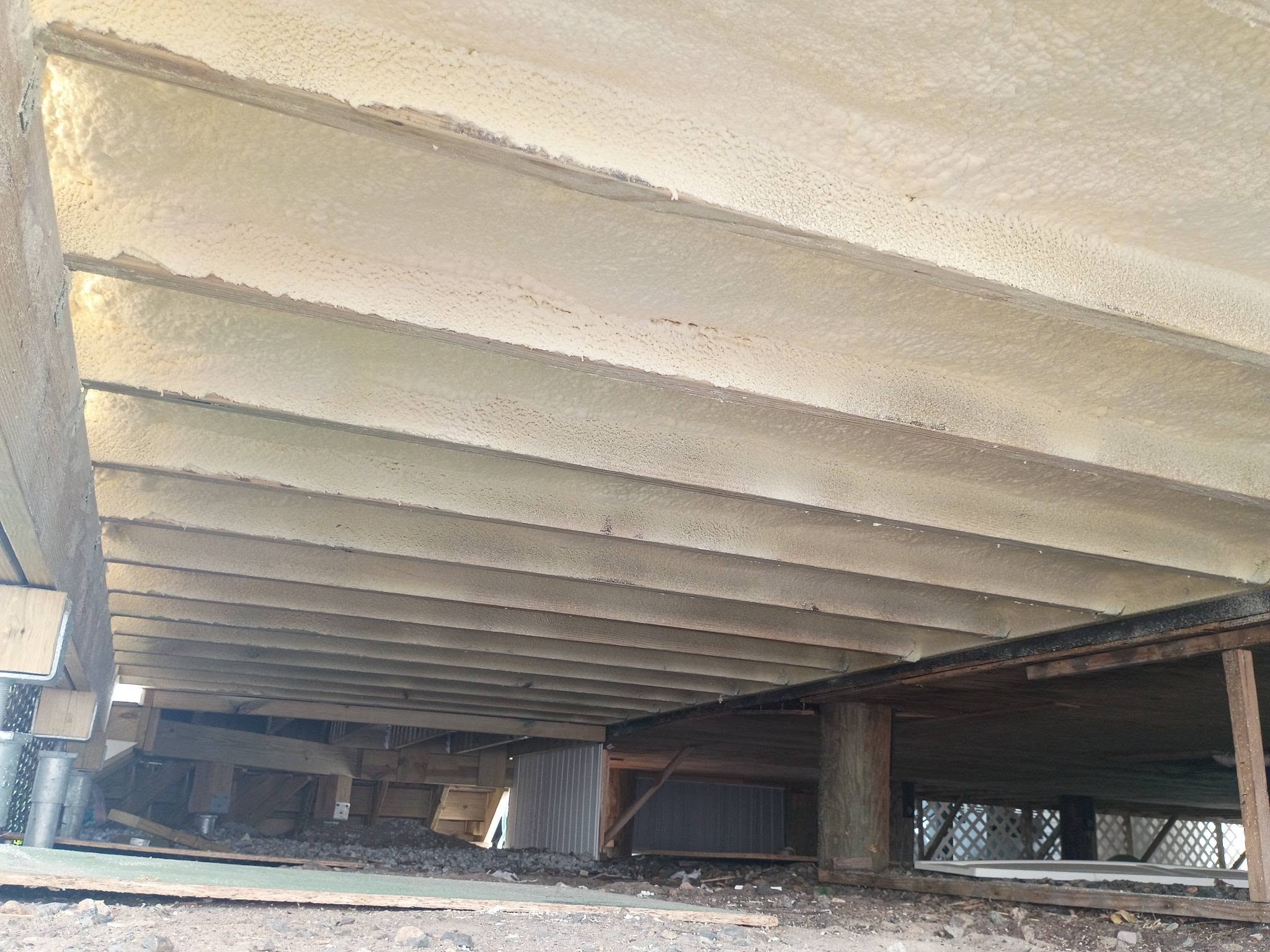 Underside spray foam insulation at a Salisbury Beach Massachusetts coastal property